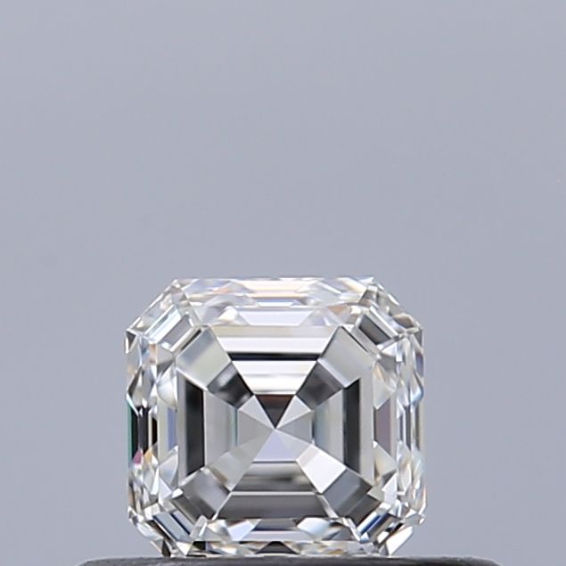Catalogue photograph of an Asscher-cut diamond with clipped corners and concentric step facets on a grey background.