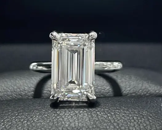 Emerald cut diamond solitaire ring