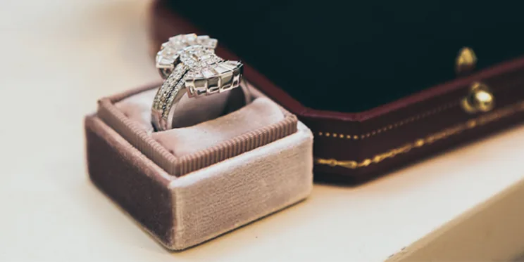 A restored diamond ring in its box