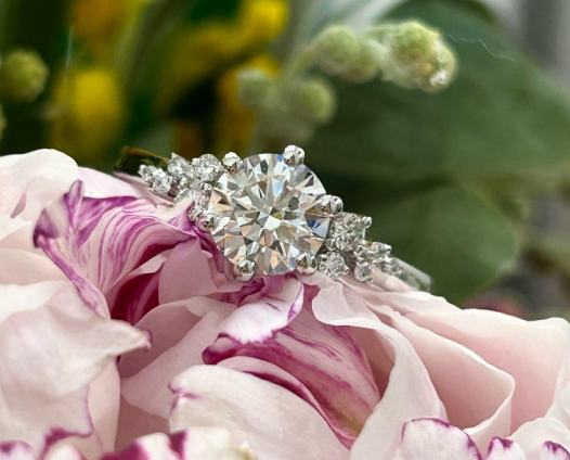 Round diamond ring on flowers